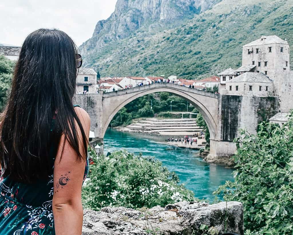 All you need is one day to be welcomed by the locals and discover the historic charm of Mostar. Here's why you should visit Mostar, Bosnia and Herzegovina. | #mostar #bosniaandherzegovina #balkantour #balkans