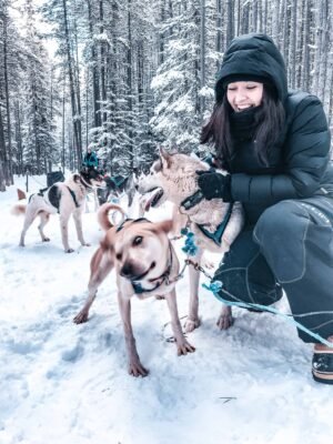 It’s the quintessential Canadian adventure, dog sledding in Alberta Canada- home of the Canadian Rockies. If you are planning a winter vacation, or holiday to Banff, Lake Louise, or Canmore, you must add dog sledding to your winter activity list! Perfect for all travellers, backpackers, solo travellers, families! #winter #canada #banff #dogsledding