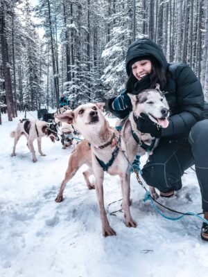 It’s the quintessential Canadian adventure, dog sledding in Alberta Canada- home of the Canadian Rockies. If you are planning a winter vacation, or holiday to Banff, Lake Louise, or Canmore, you must add dog sledding to your winter activity list! Perfect for all travellers, backpackers, solo travellers, families! #winter #canada #banff #dogsledding