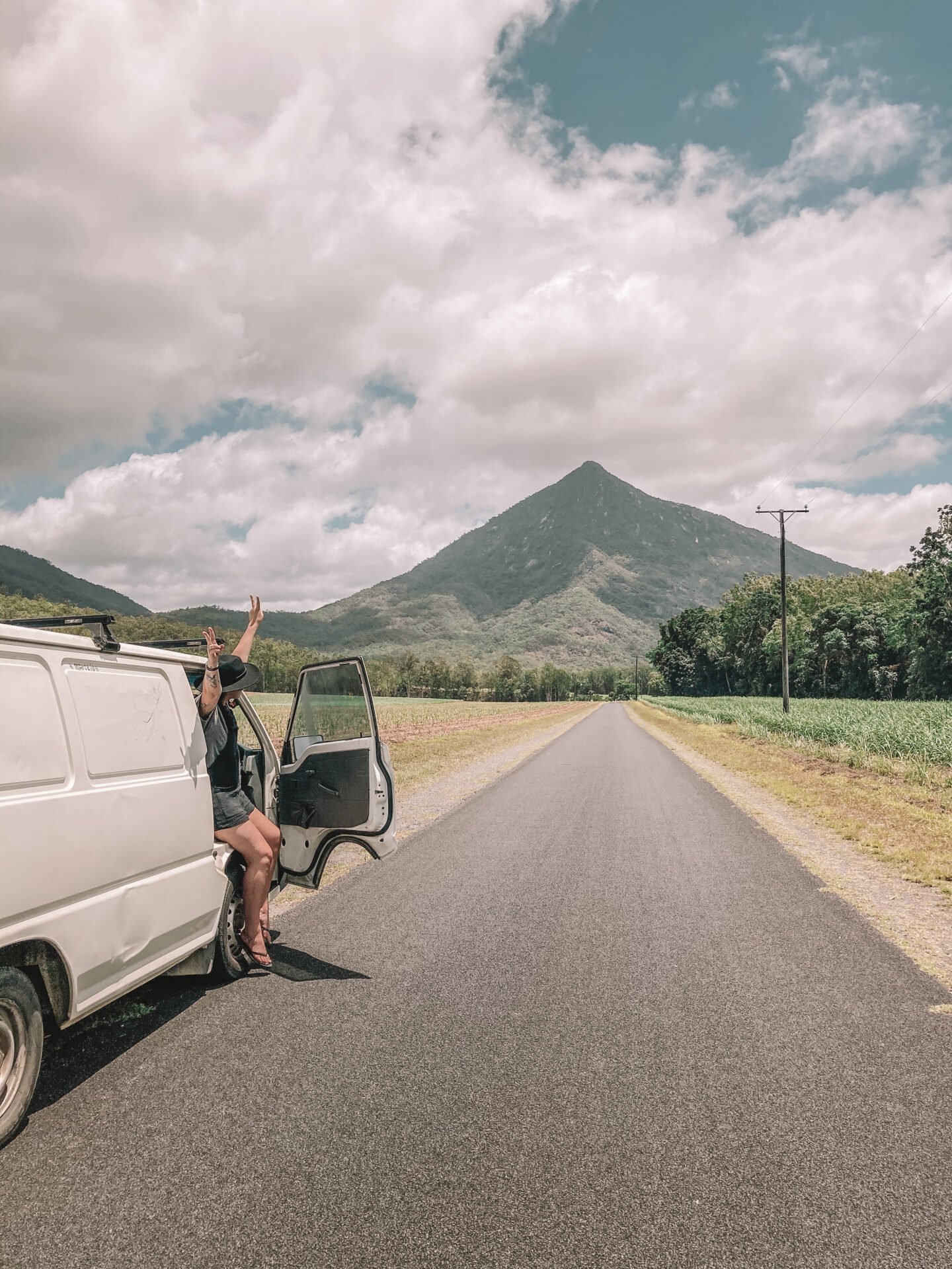 woman sitting on the passenger seat in a van